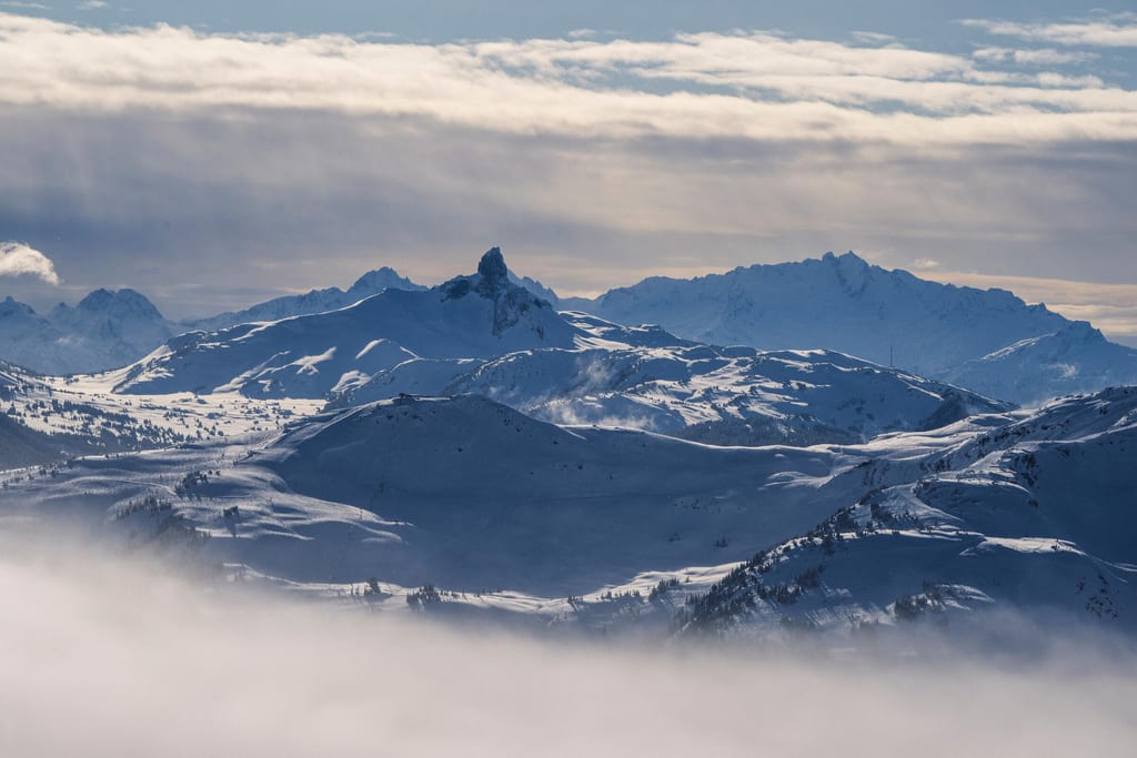 Snowy peaks above the clouds
