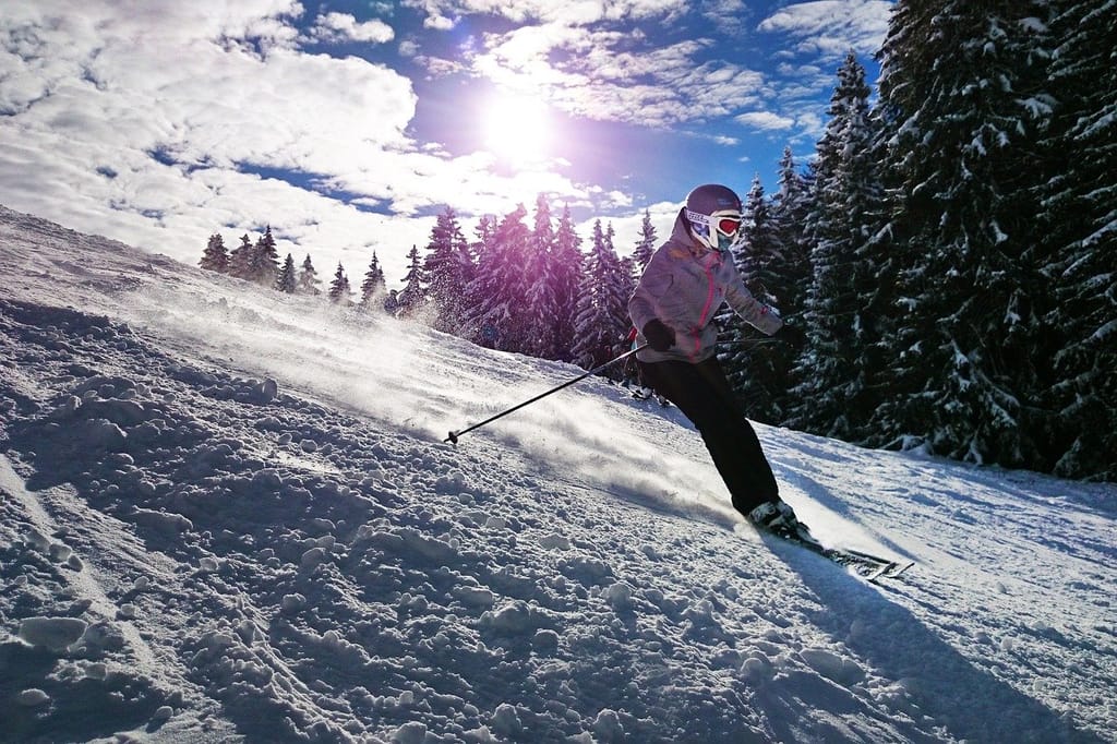 Skier carving fresh powder in Whistler